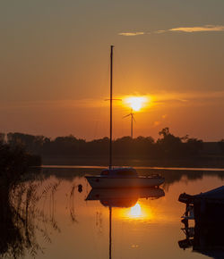 Silhouette of marina at sunset