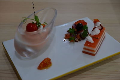High angle view of fresh vegetables in plate on table