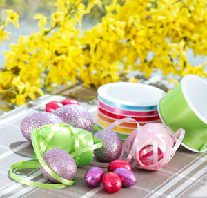 Close-up of various flowers on table