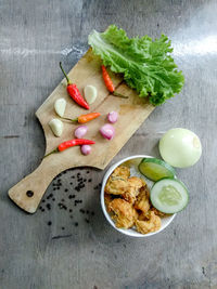 High angle view of fruit salad in bowl on table