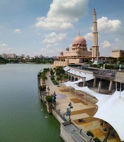 River by putra mosque against sky