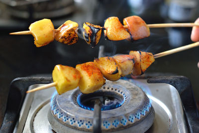 High angle view of meat on barbecue grill