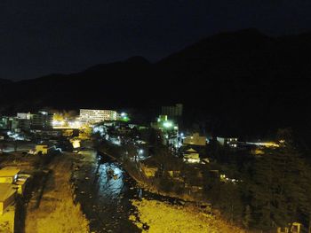 Illuminated cityscape at night