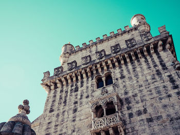 Low angle view of historic building against clear sky