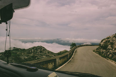 Panoramic shot of car on road against sky