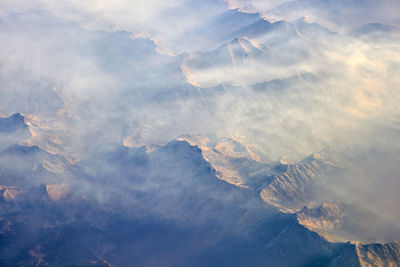 Low angle view of mountain range against sky