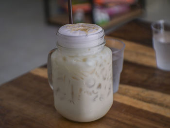 Close-up of drink in jar on table