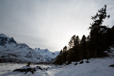 Scenic view of mountains against sky during winter