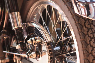 Cropped image of motorcycle wheel