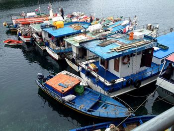 High angle view of ferry boats moored in lake