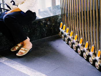 Low section of woman standing on floor