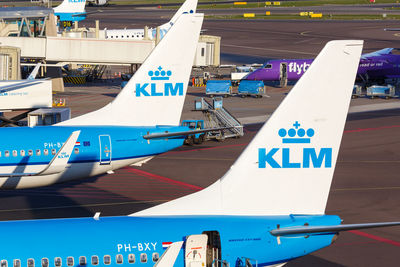 High angle view of airplane on airport runway