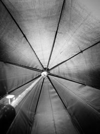 Close-up of wet umbrella at night