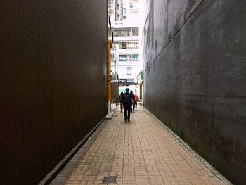 People walking on street in city