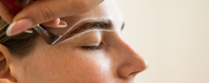 Close-up of man with nail