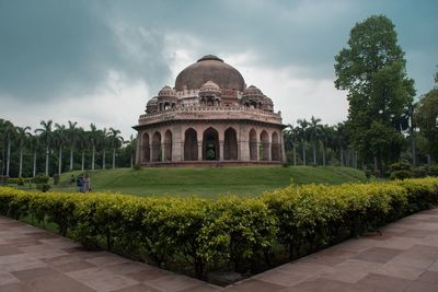 View of historical building in garden