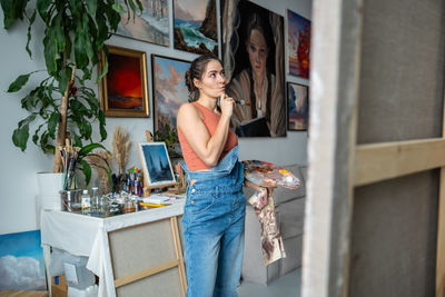 Portrait of young woman looking away