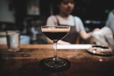 Wineglass on table in restaurant