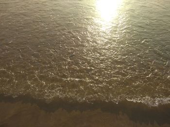 High angle view of sea against sky during sunset