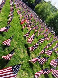 High angle view of flags on field