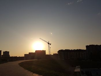 Buildings against sky during sunset