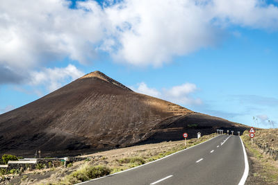 Road passing through volcano mountain