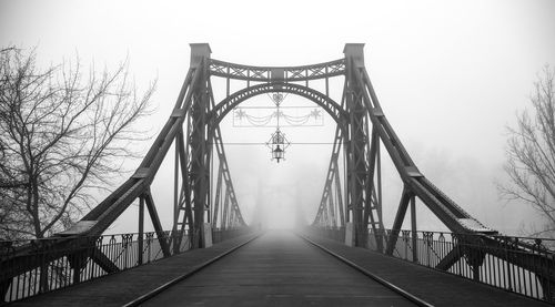 View of footbridge against sky