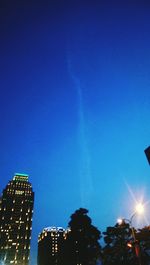 Low angle view of modern building against clear sky