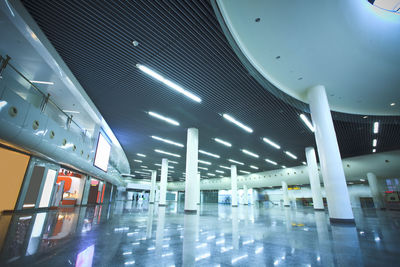 Low angle view of illuminated modern building