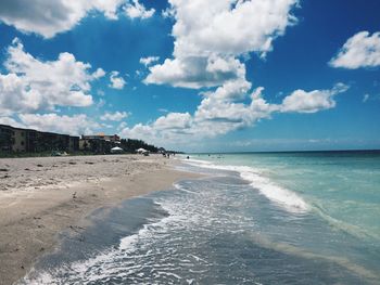 Scenic view of beach against sky