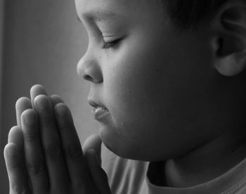 Close-up of boy looking away