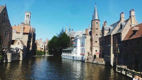 Canal passing through city buildings