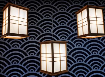 Low angle view of window in illuminated room