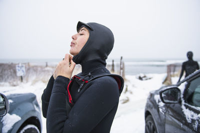 Man looking at sea against sky