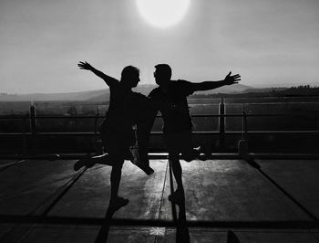 Men with people in background