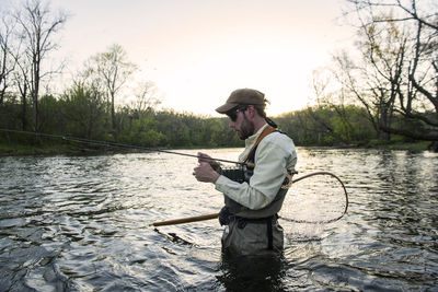 Flyfishing at sunset during a caddis emergence