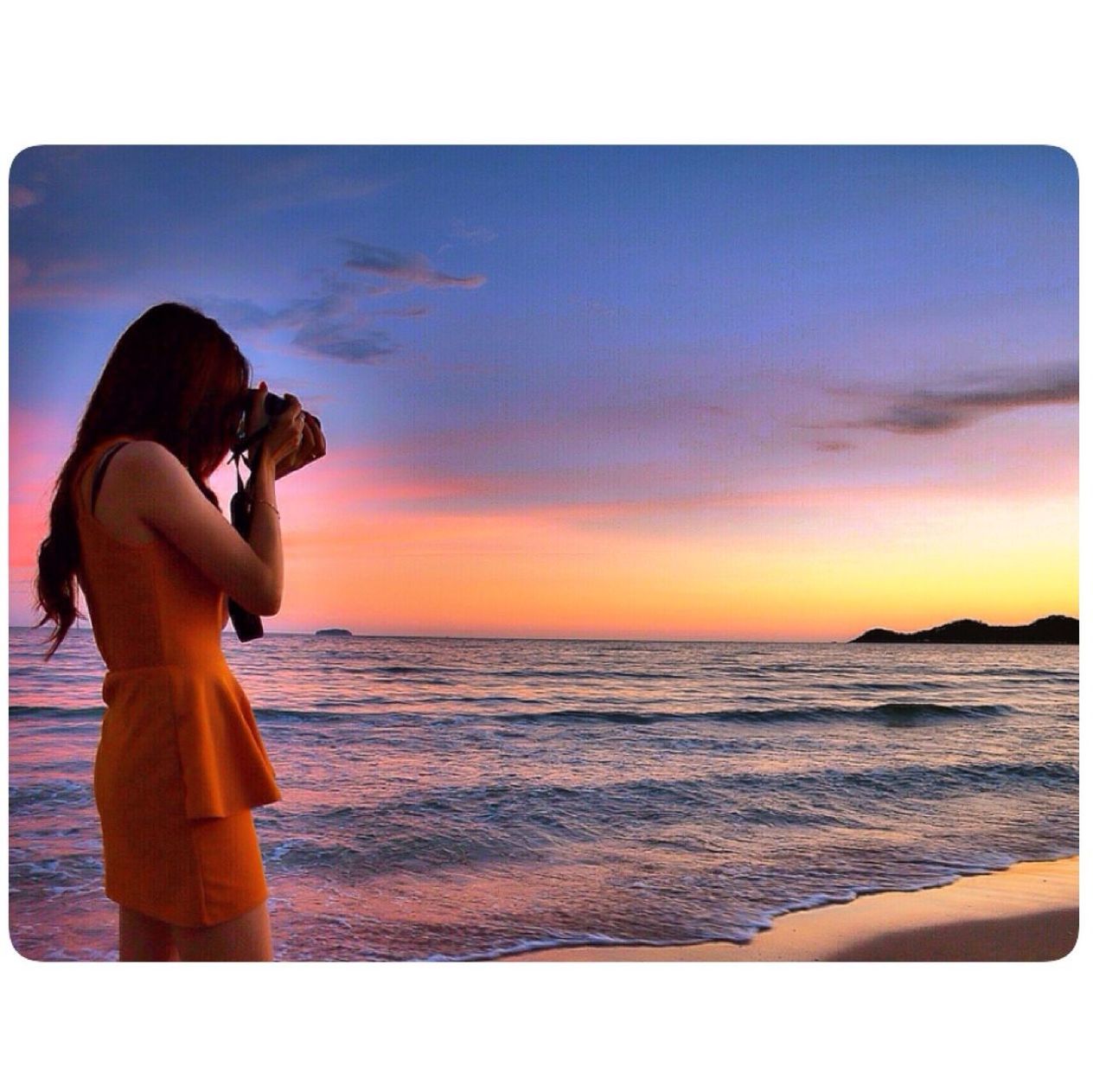 sea, horizon over water, water, transfer print, sky, sunset, auto post production filter, scenics, beauty in nature, lifestyles, tranquil scene, leisure activity, beach, tranquility, holding, nature, idyllic, orange color