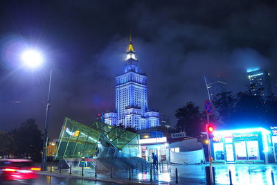 Low angle view of skyscrapers lit up at night