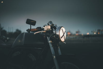 Close-up of bicycle against sky