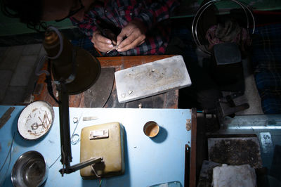 Man working on shelf