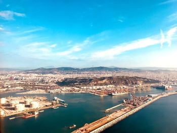 High angle view of city against cloudy sky