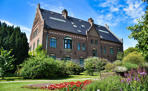 View of typical scandinavian building in lund's botanical park