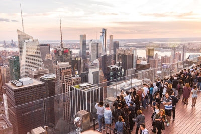 High angle view of city at sunset