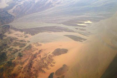 High angle view of land against sky