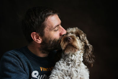 Portrait of man with dog