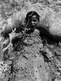 Portrait of boy in rock