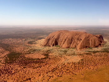 Rock formations in desert against sky