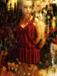 Digital composite image of woman looking away while standing at night