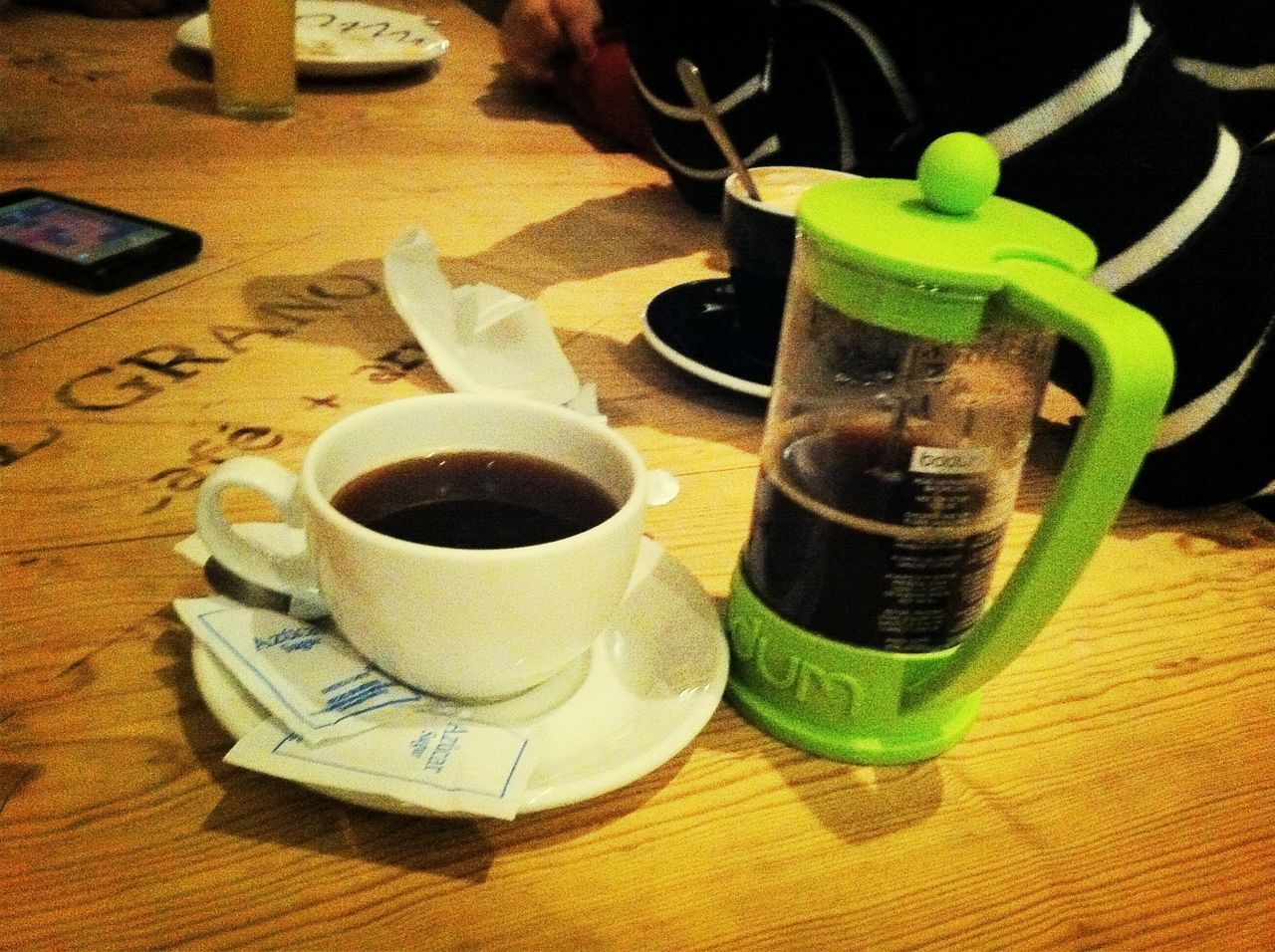 table, still life, indoors, drink, food and drink, wood - material, high angle view, close-up, coffee cup, refreshment, freshness, no people, wooden, cup, coffee - drink, tea cup, absence, bottle, container, two objects