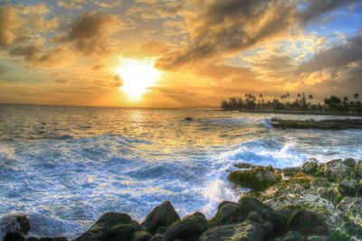 Scenic view of sea at sunset